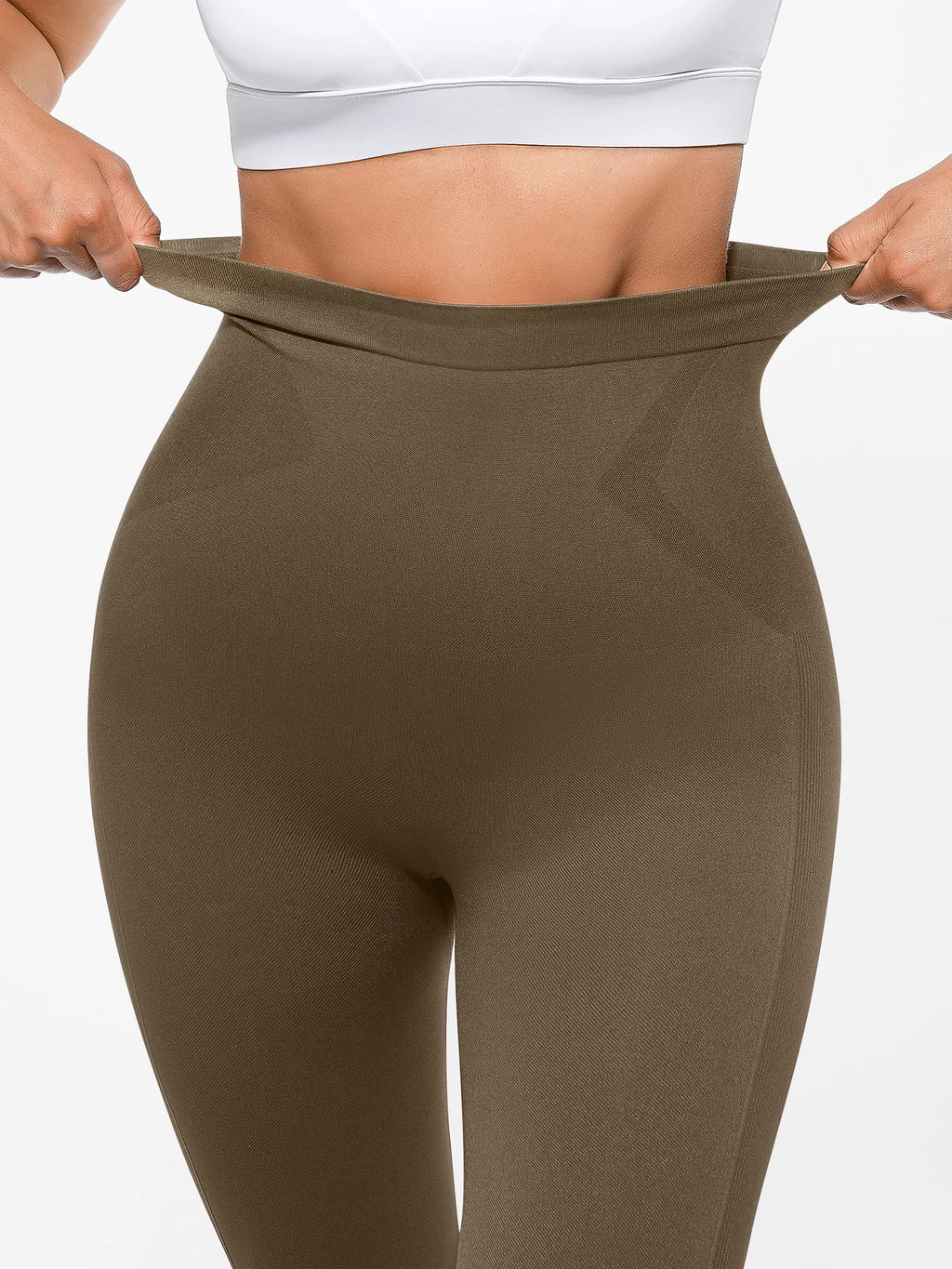 Lya wears High-Waist Shaping Leggings