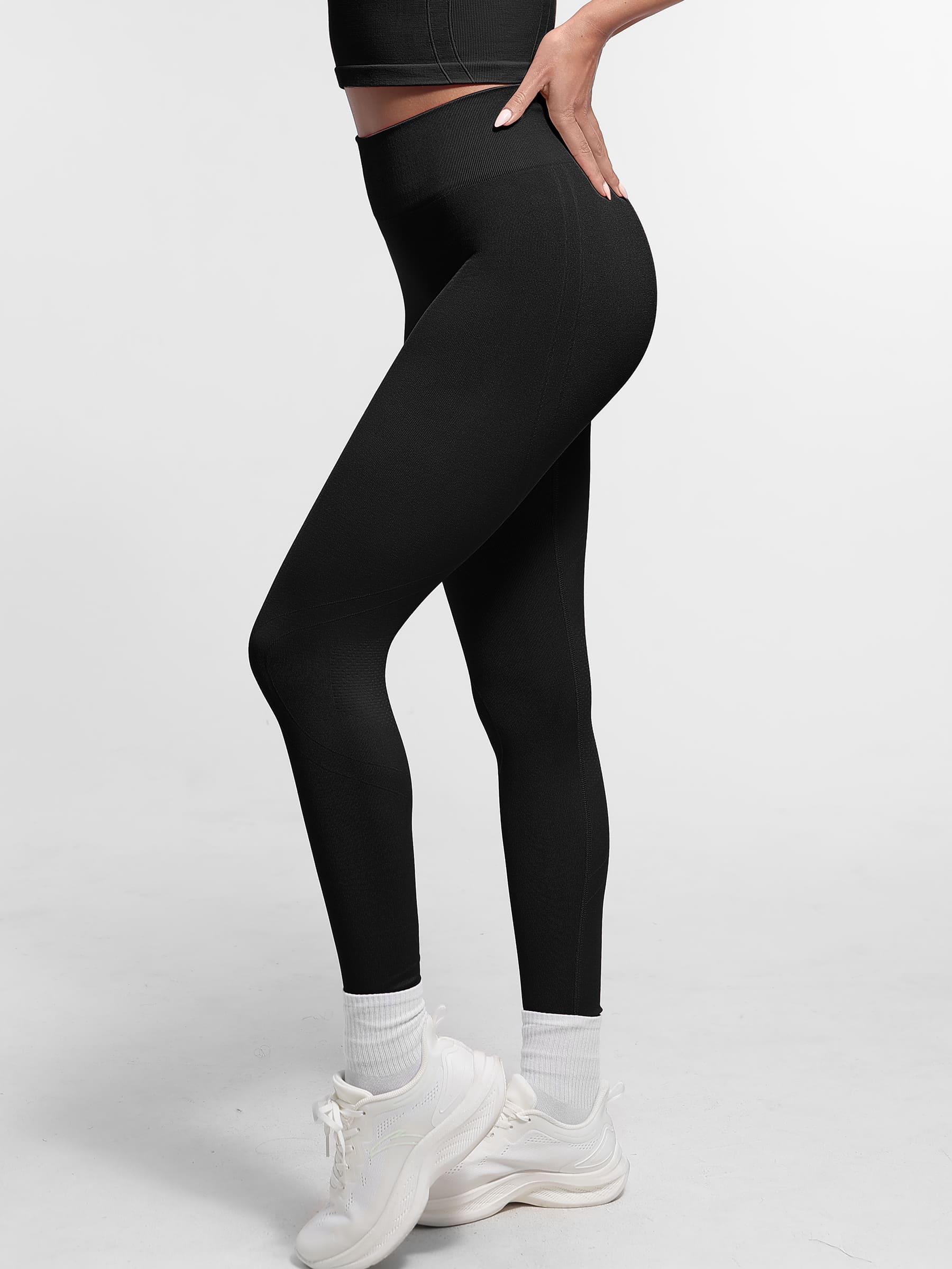 Lya wears Seamless High Waist Yoga Leggings for Women with Double Layer Waistband