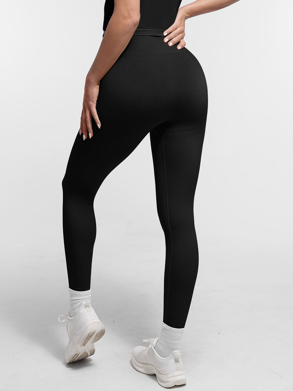 Lya wears Seamless High Waist Yoga Leggings for Women with Double Layer Waistband