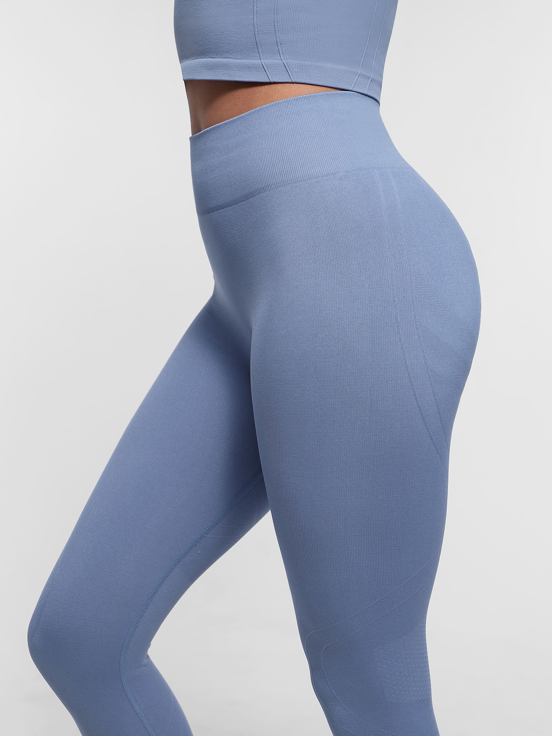 Lya wears Seamless High Waist Yoga Leggings for Women with Double Layer Waistband