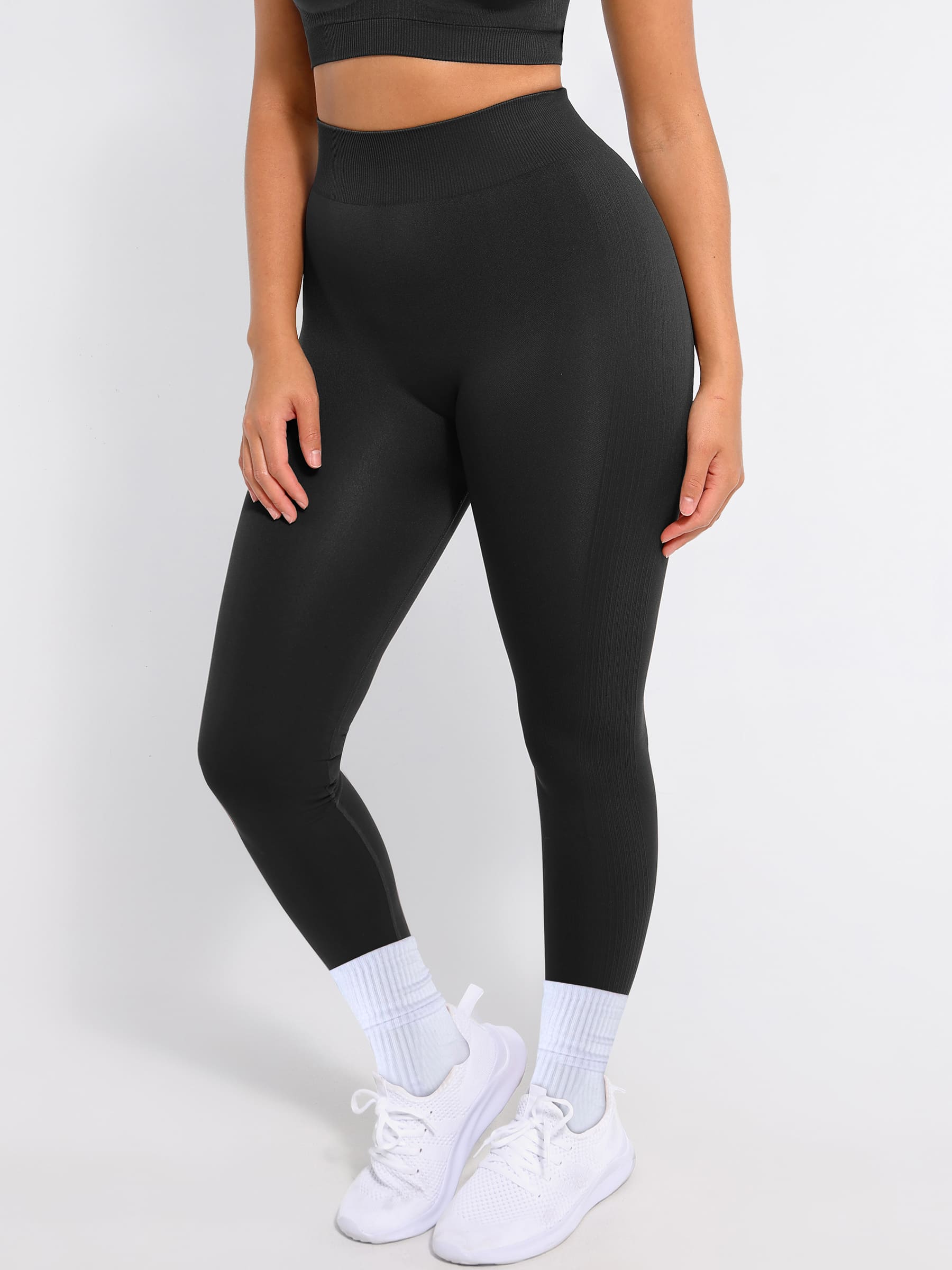 Lya wears Seamless High Waisted Yoga Leggings for Tummy Control and Leg Sculpting