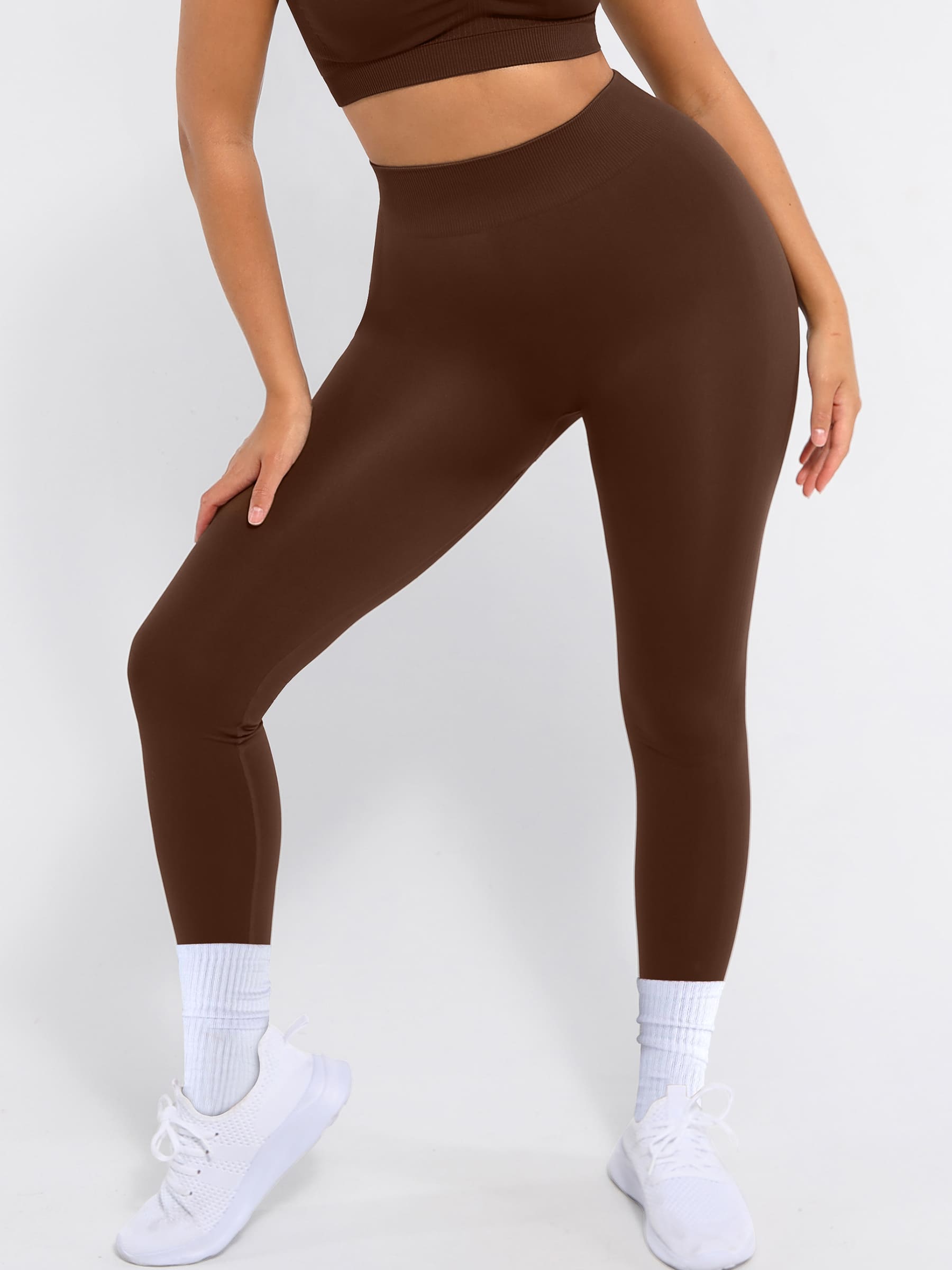 Lya wears Seamless High Waisted Yoga Leggings for Tummy Control and Leg Sculpting