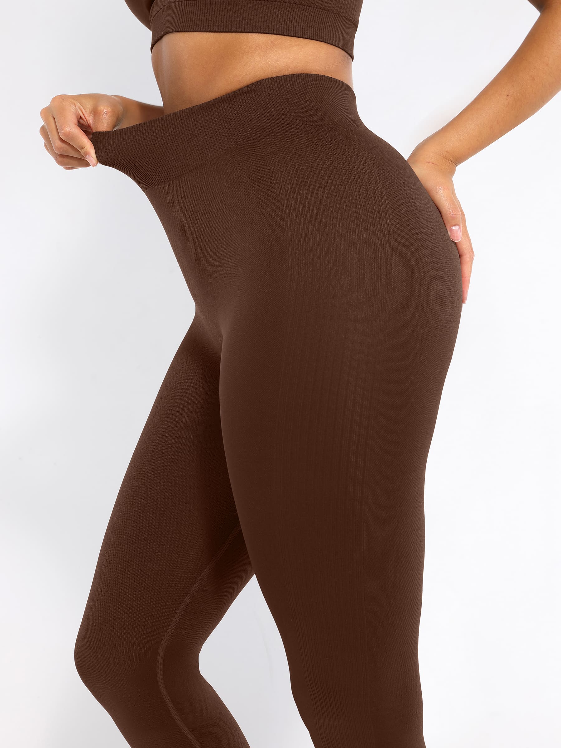 Lya wears Seamless High Waisted Yoga Leggings for Tummy Control and Leg Sculpting
